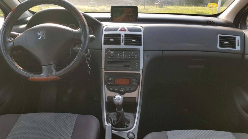 ox_peugeot-307-sw20-hdi90km2005panoramanaviklimaaut