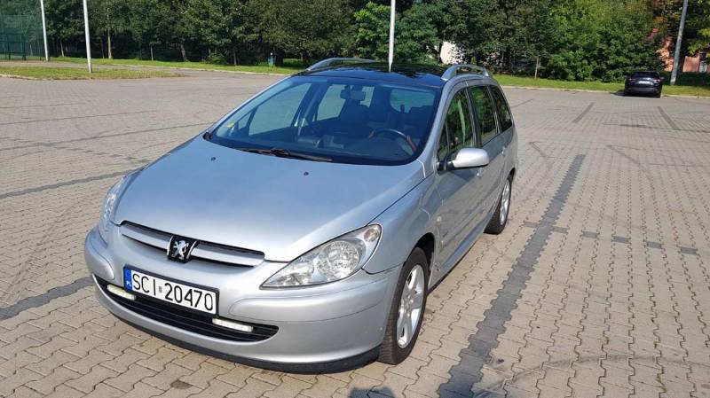 ox_peugeot-307-sw20-hdi90km2005panoramanaviklimaaut