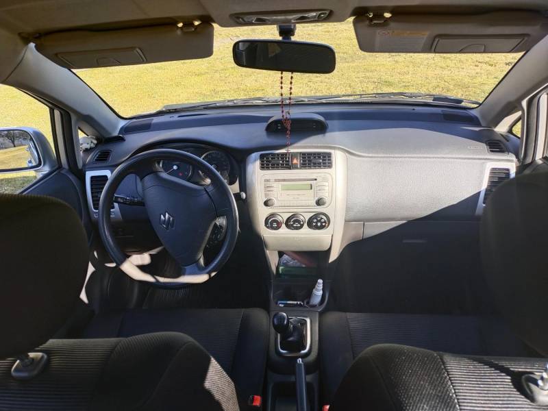 ox_sprzedam-samochod-suzuki-liana-16-komfort-4x4