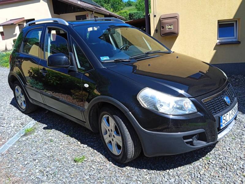ox_fiat-sedici-z-napedem-4x4-przebieg-159-tys-dodatkowe-kola-zimowe