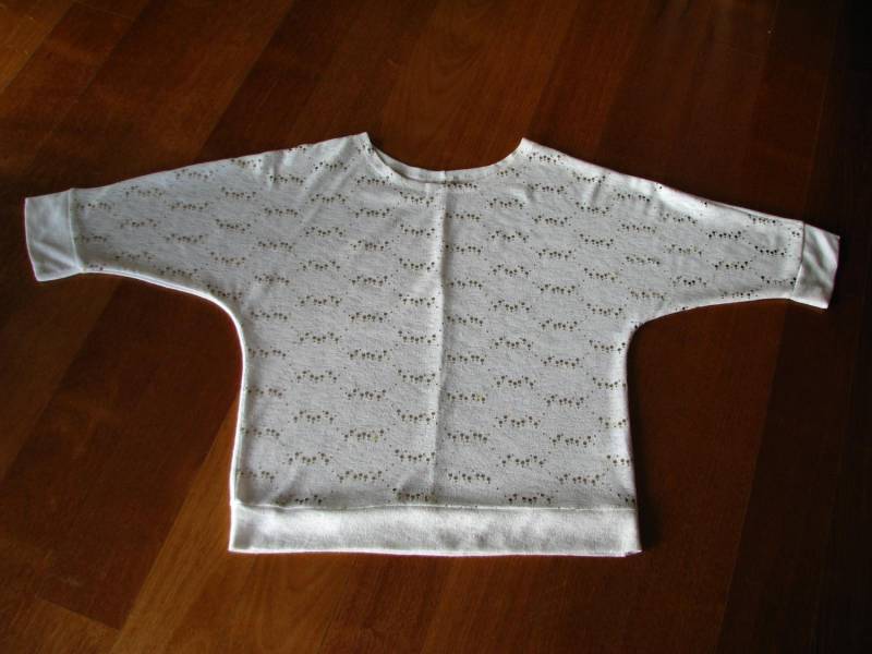 ox_luzny-bialy-sweterek-bluzka-z-cekinkami-l-xl
