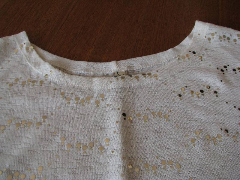 ox_luzny-bialy-sweterek-bluzka-z-cekinkami-l-xl