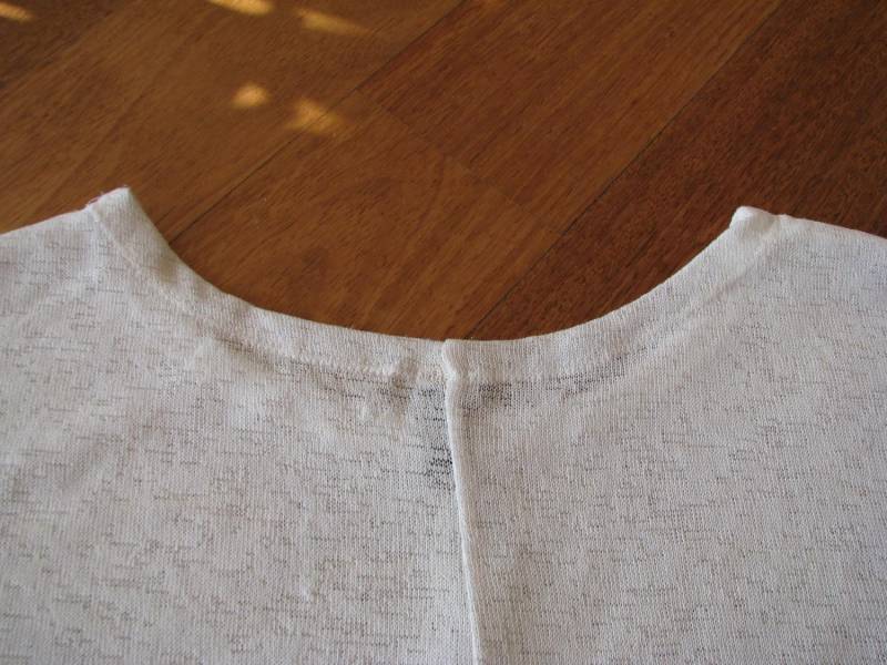 ox_luzny-bialy-sweterek-bluzka-z-cekinkami-l-xl